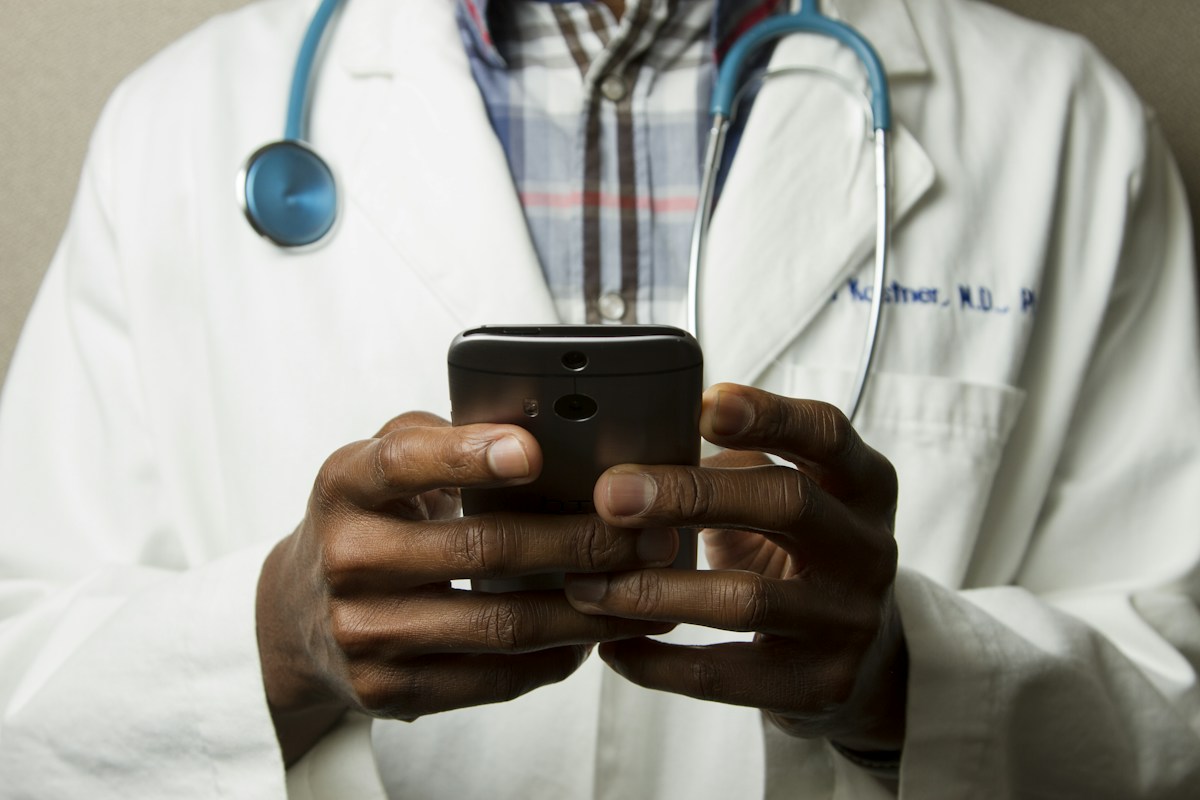 A healthcare professional wearing a stethoscope